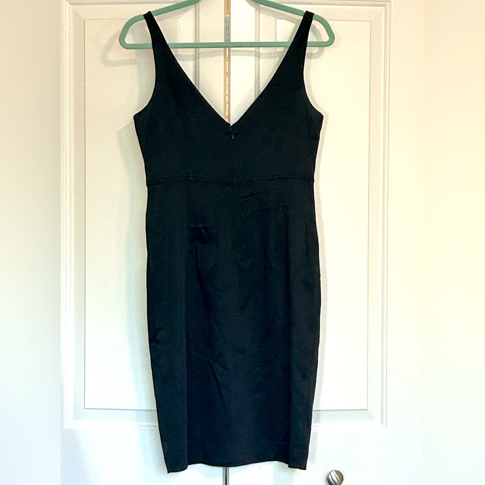 Silky black dress good for many occasions.